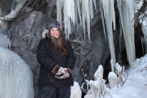 Katie Weaver stands in front of the "ice caves", a little known tourist attraction in Yellowknife, NWT.