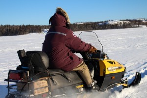 Ken Weaver rides along Great Slave Lake to reach the community of Dettah, NWT.