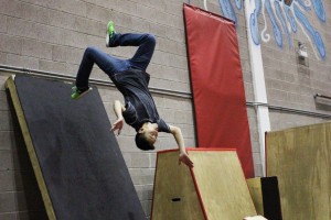 A fellow at Breathe Parkour allowed me to shoot this photo of him practicing a wall flip.